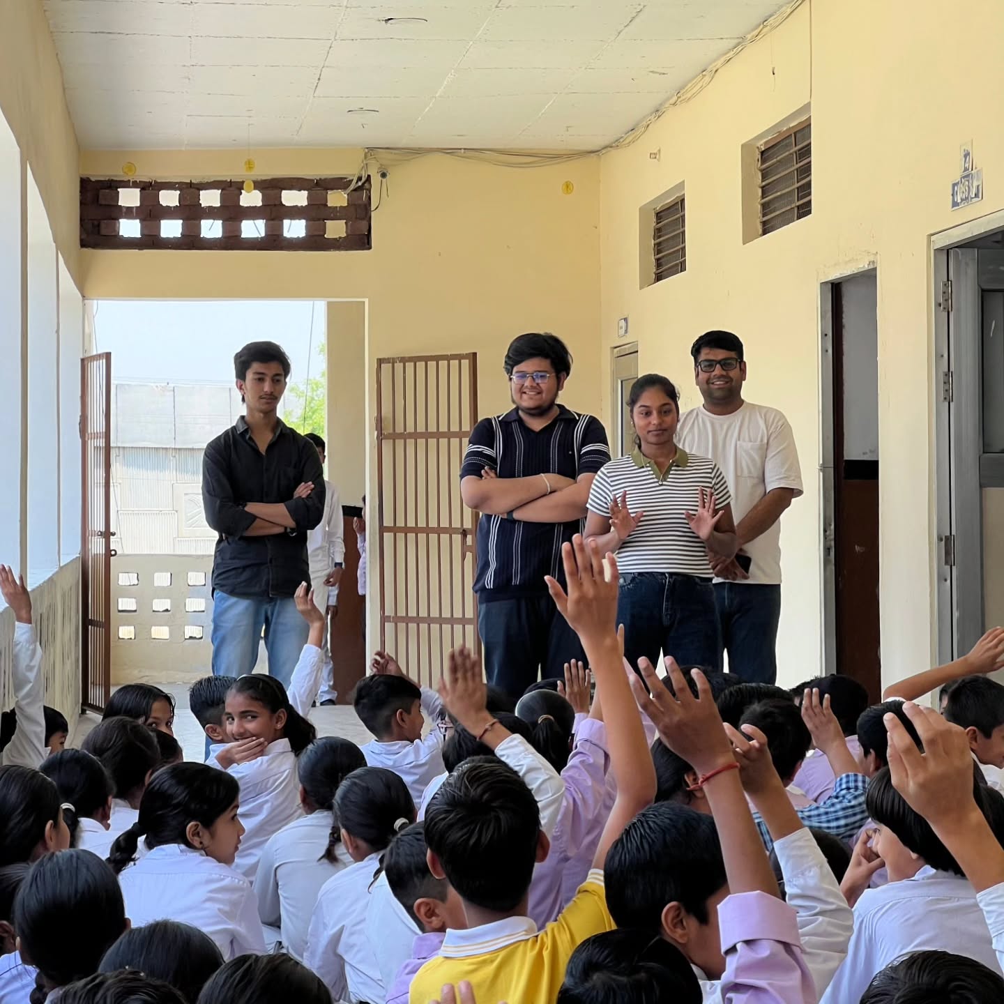 Allin mentors leading a Mind Mining session for a hall of school students
